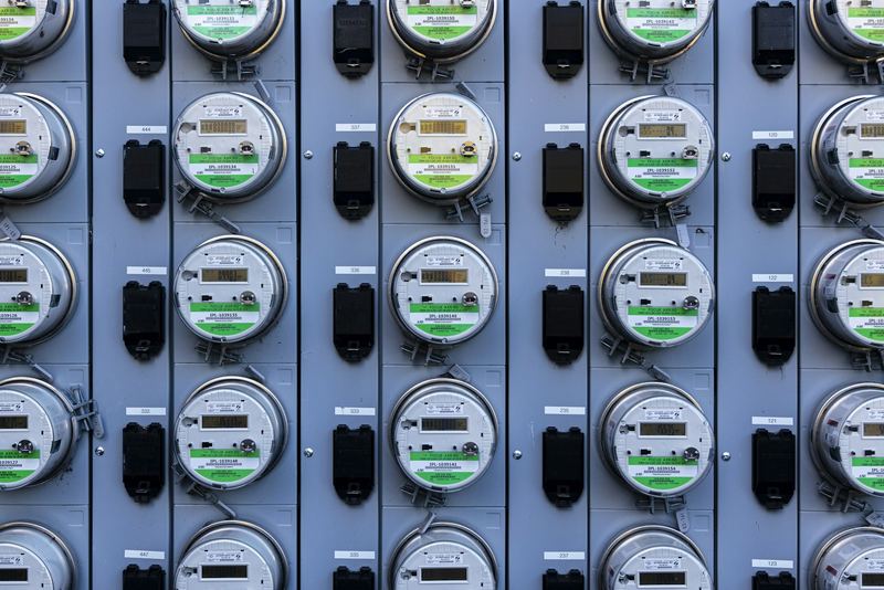 Bank of electric meters mounted on a utility panel